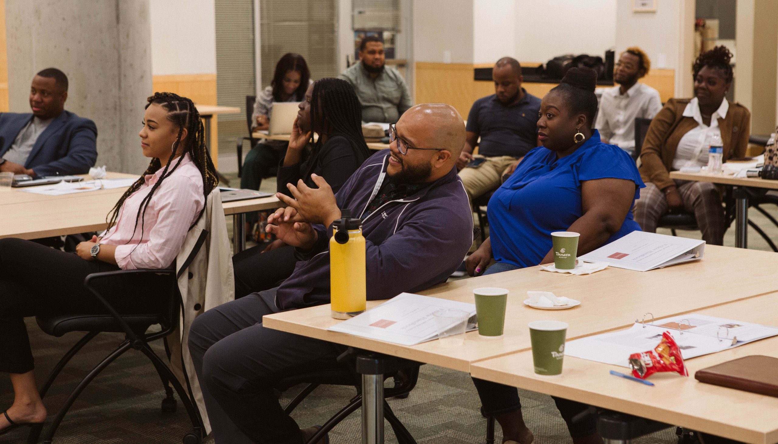 People listening and learning in a classroom